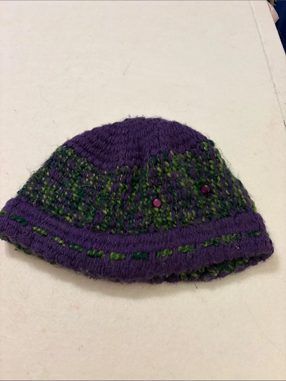 Handmade hat, greens and purples